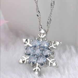 Silver Blue crystal snowflake necklace.